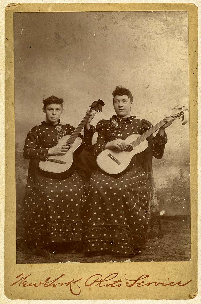 Two Women With Guitars